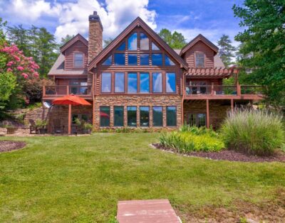 Luxe lakefront retreat with fishing dock, deck, firepit, patio & pool table