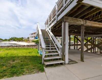 Waterfront stilt cottage on the open Gulf of Mexico will make you feel like you’re on a houseboat!