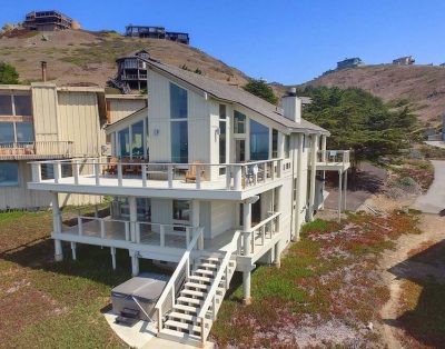 Incredible Ocean Front Home with 3 Master Suites and Secluded Beach