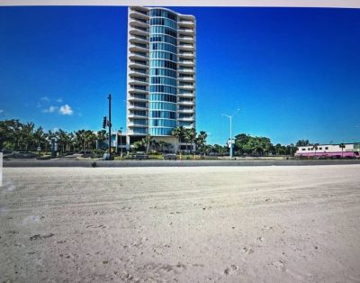 Floor To Ceiling Windows Overlook The Gulf Of Mexico’s Pristine White Beaches